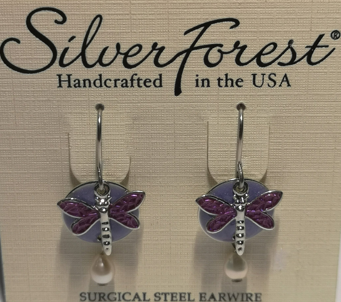 Silver forest surgical steel dangle earrings with purple flat disk and dragonfly and white pearl