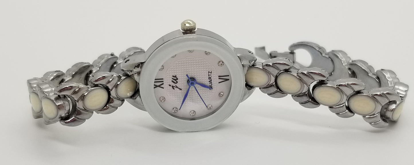 Silver base metal and white strap watch with rhinestones on watch face